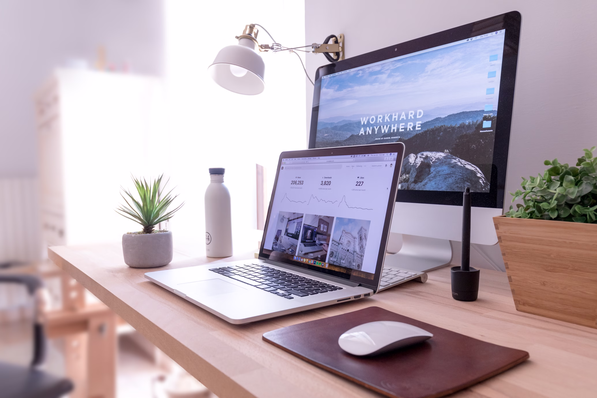 A stock photo of minimalist clean office desk setup no wires professional workspace